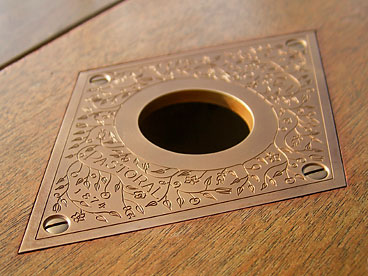 Brass umbrella plate with decorative vine and flora engraving 